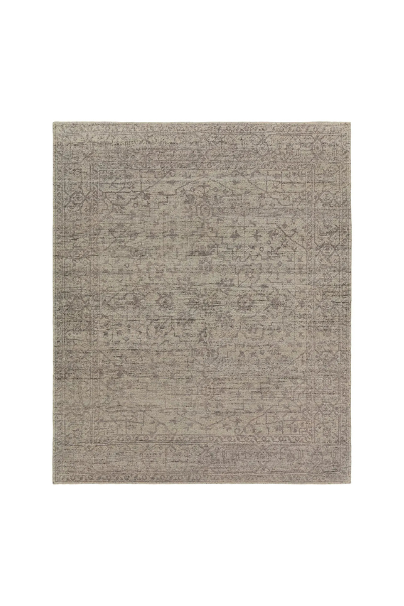 hand knotted wool rug
heirloom craftsmanship rug
vintage inspired rug
abrashed pattern
washed medallion design rug
gray and cream rug
subtle black accents
timeless elegant rug
sophisticated home decor rug
durable artisan rug