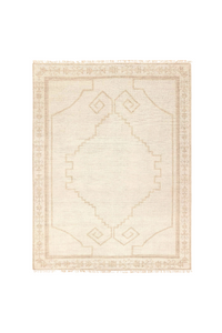 vintage rug
modern rug
wool rug
beige rug
cream rug
medallion rug
fringe rug
global style rug
stain resistant rug
soft wool rug
handwoven rug
living room rug
timeless rug
ethical rug
luxury rug