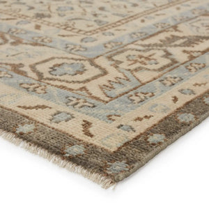 hand-knotted rug
wool rug
geometric rug
medallion rug
floral border rug
sky blue rug
neutral rug
artisan rug
traditional rug
timeless rug
versatile rug
durable rug
living room rug
elegant rug
refined rug
sophisticated rug
decorative rug