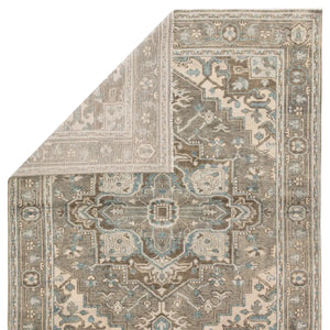 hand knotted wool rug
Serapi rug design
transitional style rug
bold center medallion rug
intricate border detail rug
vibrant rug hues
neutral gray brown cream rug
heirloom quality rug
artisan craftsmanship rug
timeless home decor