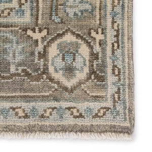 hand knotted wool rug
Serapi rug design
transitional style rug
bold center medallion rug
intricate border detail rug
vibrant rug hues
neutral gray brown cream rug
heirloom quality rug
artisan craftsmanship rug
timeless home decor